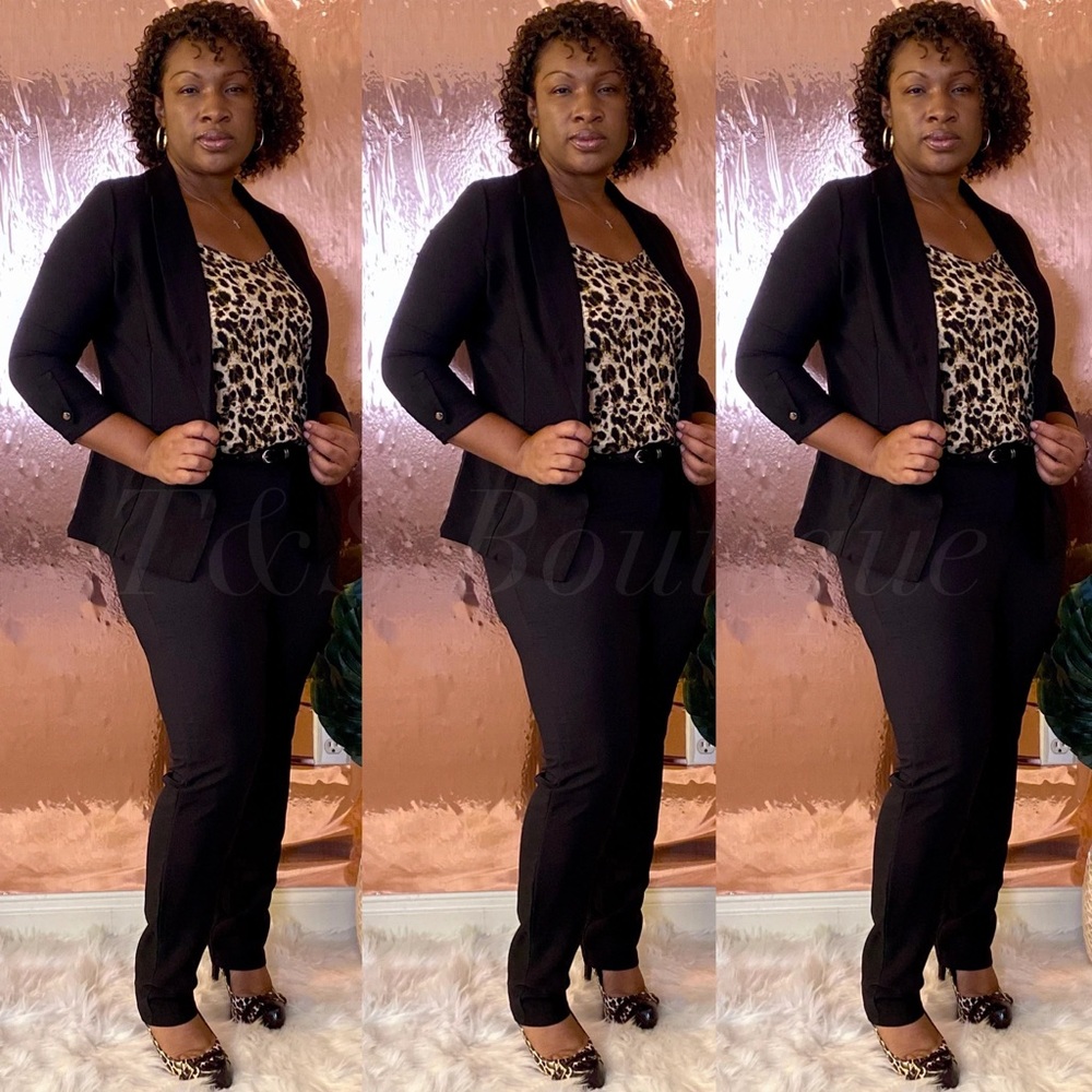 Womens 2 piece belted pants suit.